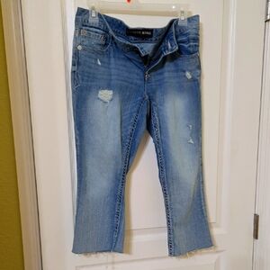 Women's Distressed Blue Jeans Capris. Express Jeans